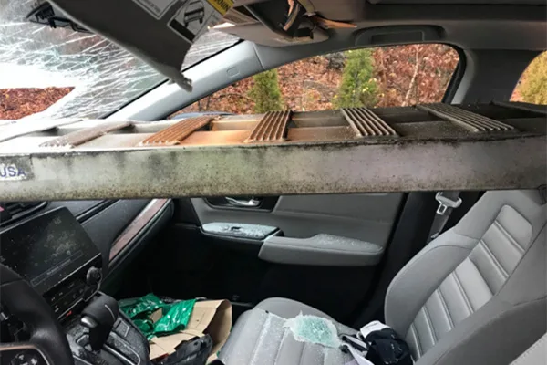 Read more about the article Ladder comes smashing through windshield narrowly missing the driver